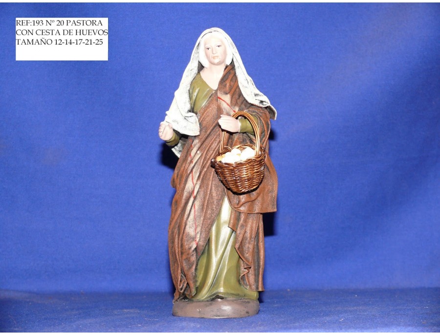 Pastora con cesta de huevos